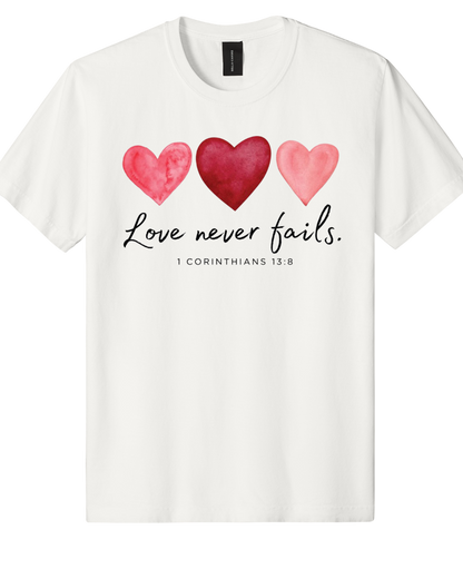 Love Never Fails Pink Heart Valentine Sweatshirt – 1 Corinthians 13:8 Faith Crewneck